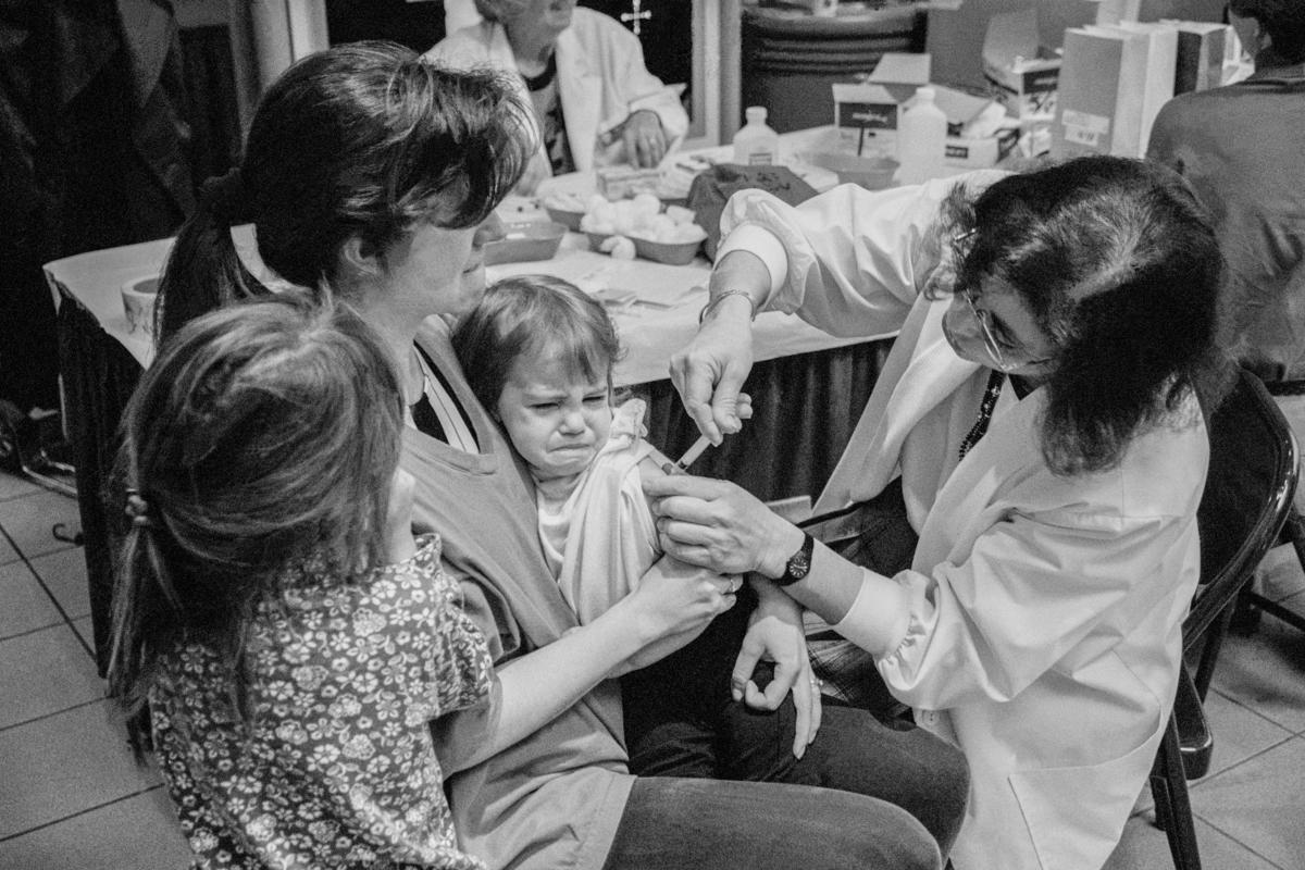 USA. ARIZONA. Phoenix. Free child immunisation in local Shopping Mall. 1994.