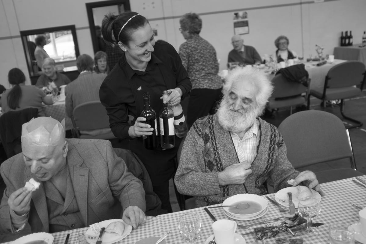 GB. WALES. Tintern. Seniors Christmas lunch in the village hall. 2013