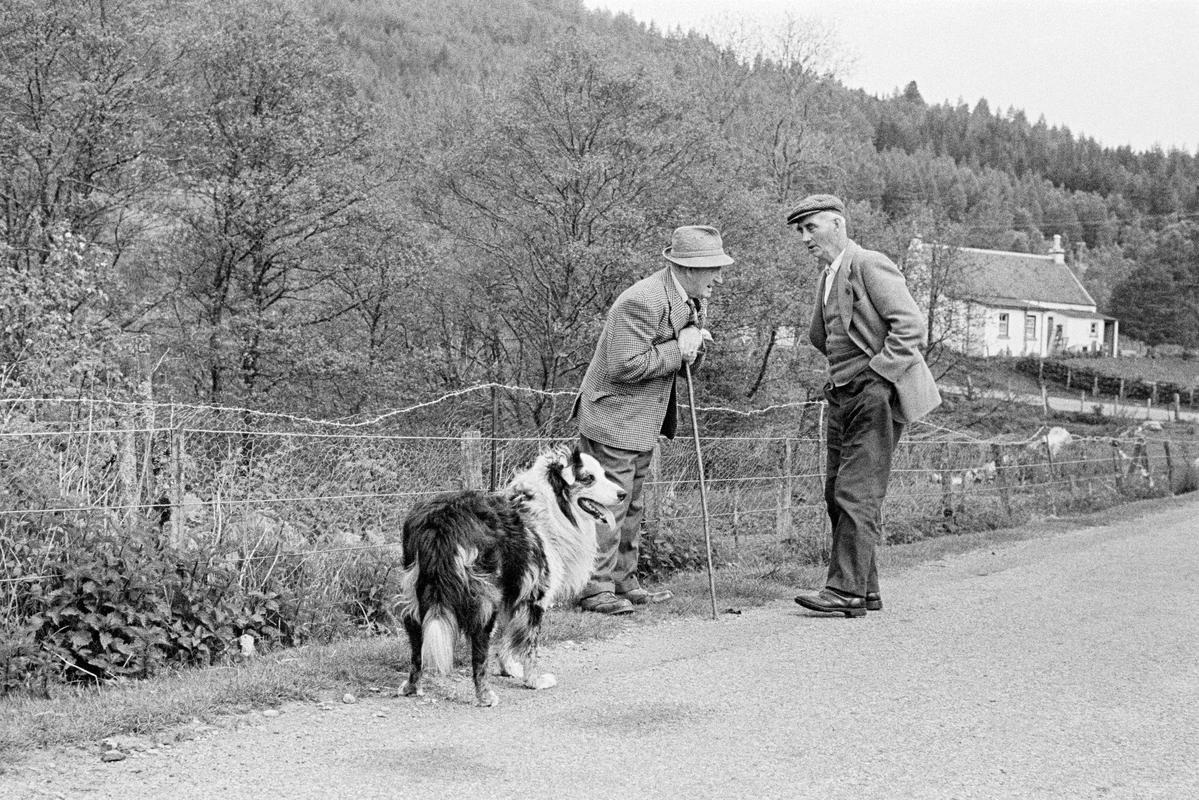 GB. SCOTLAND. Locheal. Two Scottish farmers work out the worlds problems. 1967.