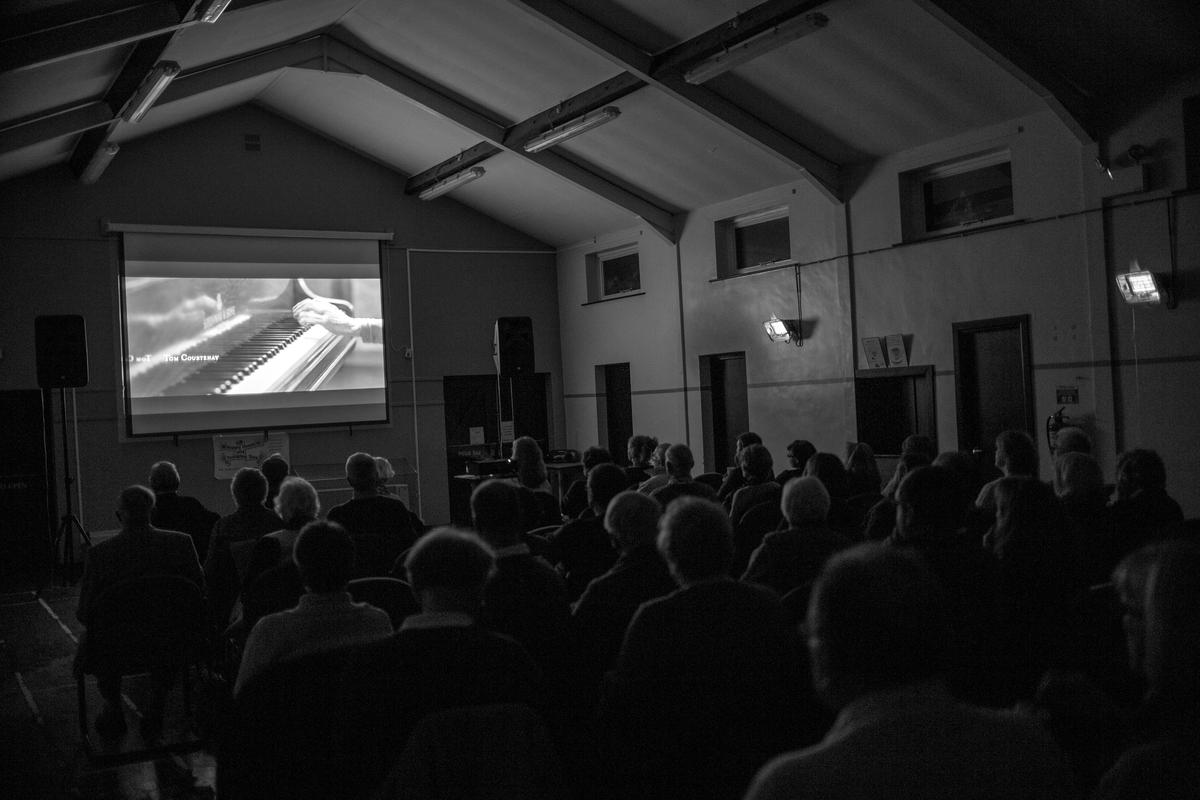 GB. WALES. Tintern. Film night in Village Hall Quartet. 2013.
