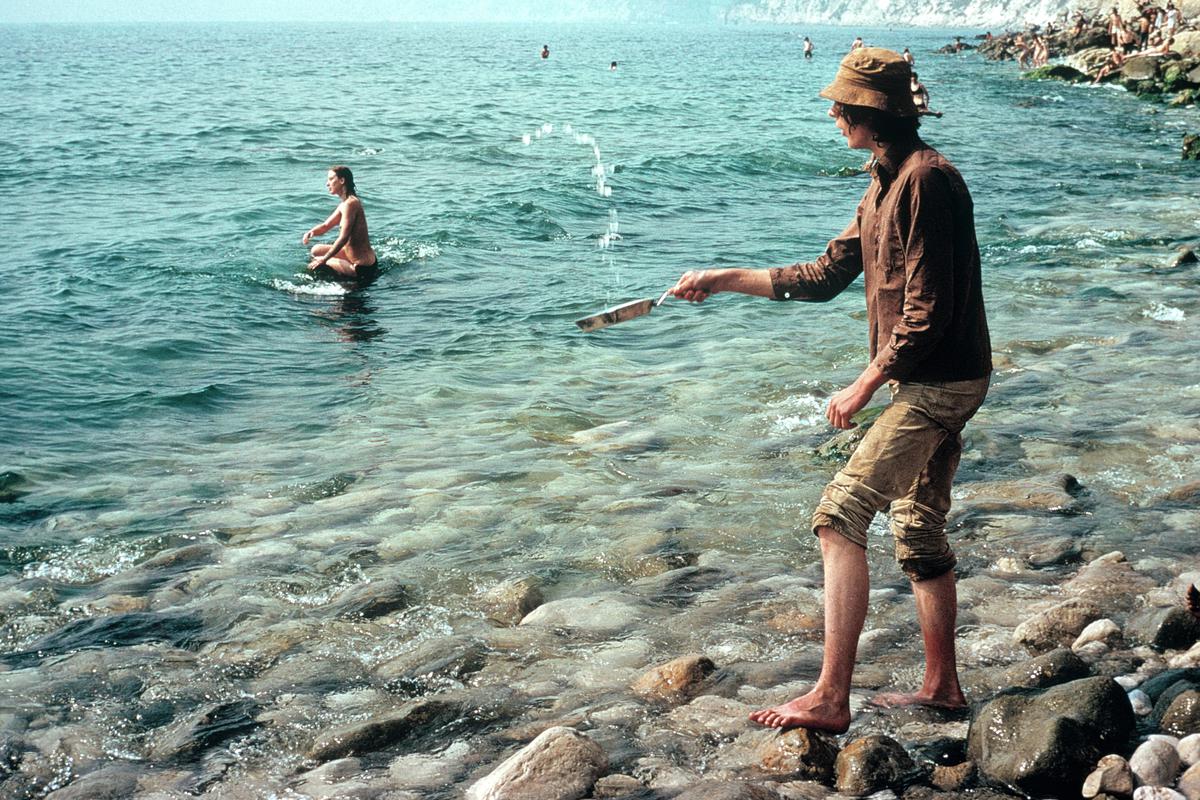 GB. ENGLAND. Isle of Wight Festival. Getting food often means a long wait, cooking your own is much better. 1969.