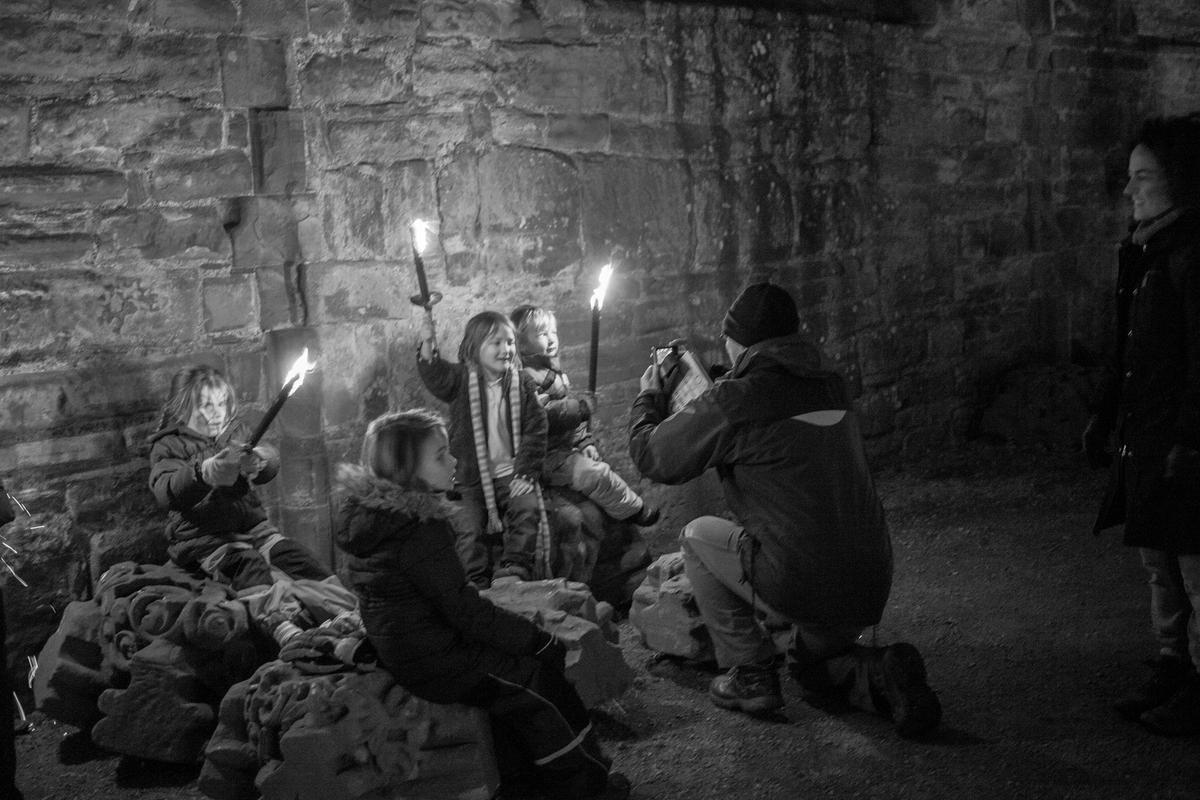 GB. WALES. Tintern. Torch Light Carol Service at Tintern Abbey with Martin Singers. 2012.