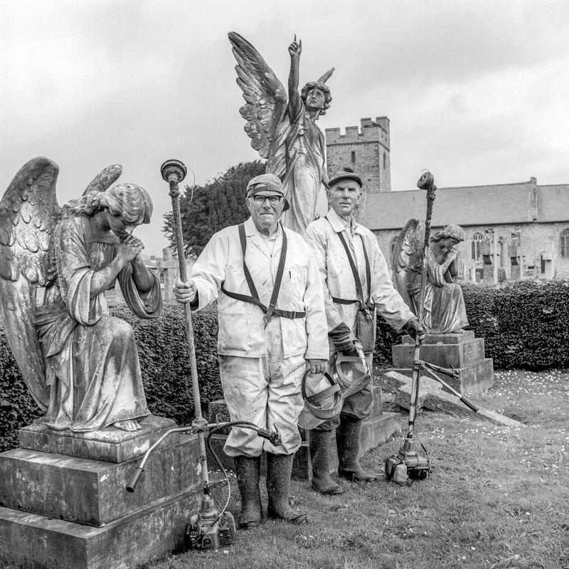 Les &amp; George Adams. Photo Shot: Llandovery, 10th June 1996. LES ADAMS - Place and date of birth: Llandovery 1928. Main occupation: Retired Council Worker. First language: English. Other languages: None. Lived in Wales: Always. GEORGE ADAMS - Place and date of birth: Llandovery 1925. Main occupation: Retired Water board worker. First language: English. Other languages: None. Lived in Wales: Always.