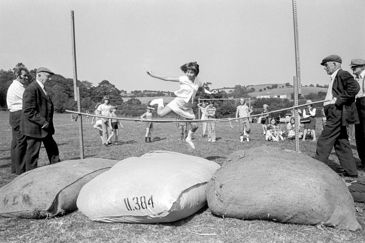 GB. WALES. Upper Chapel. The high jump at the children&#039;s sports day at Upper Chapel in Mid Wales. 1976