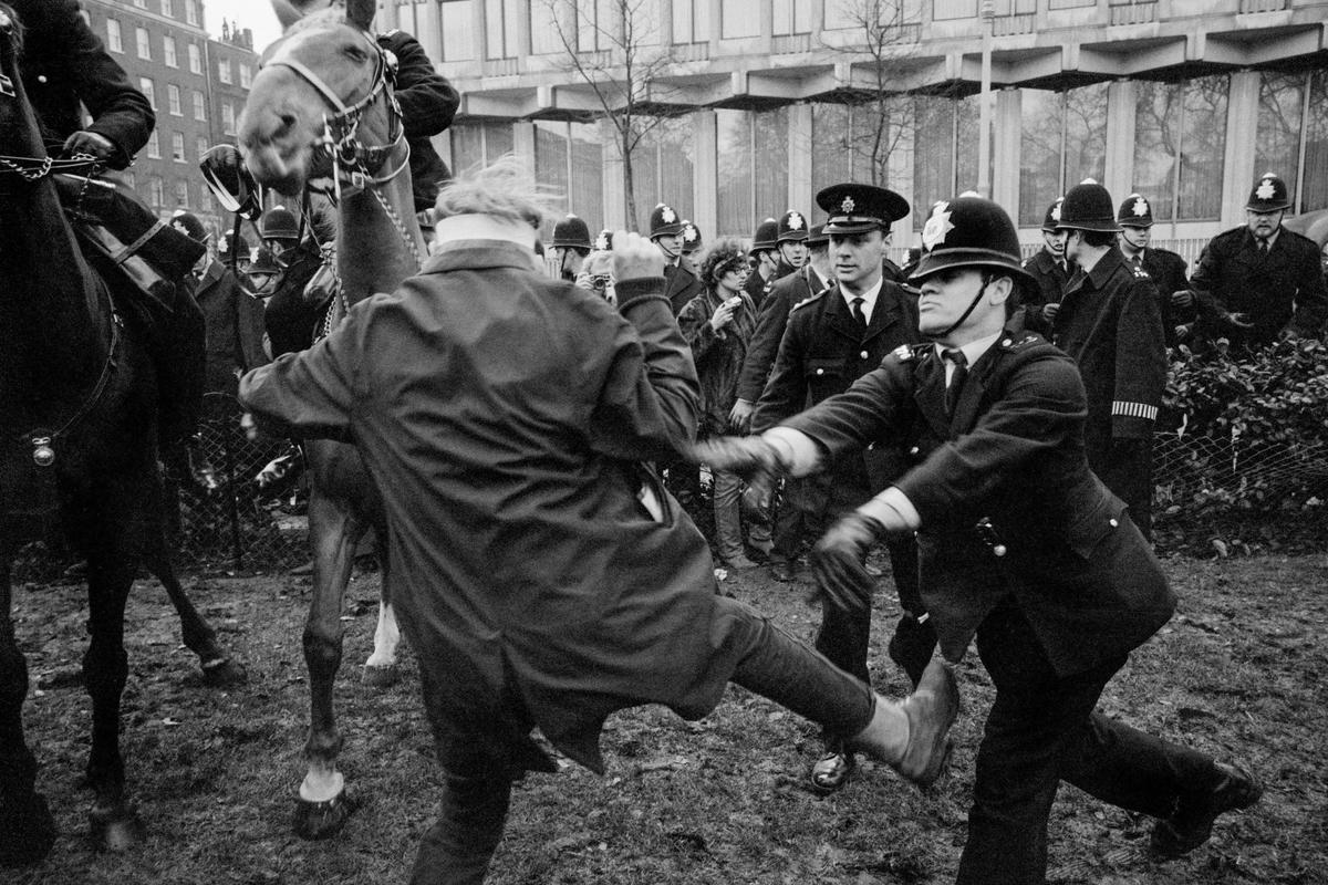 GB. ENGLAND. London. Trouble flared in Grosvenor Square, London, after an estimated 6,000 marchers faced up to police outside the United States Embassy. On March 17, an anti-war demonstration in Grosvenor Square, London, ended with 86 people injured and 200 demonstrators arrested. The protesters had broken away from another, bigger, march against US involvement in Vietnam but were confronted by a wall of police. 1968.