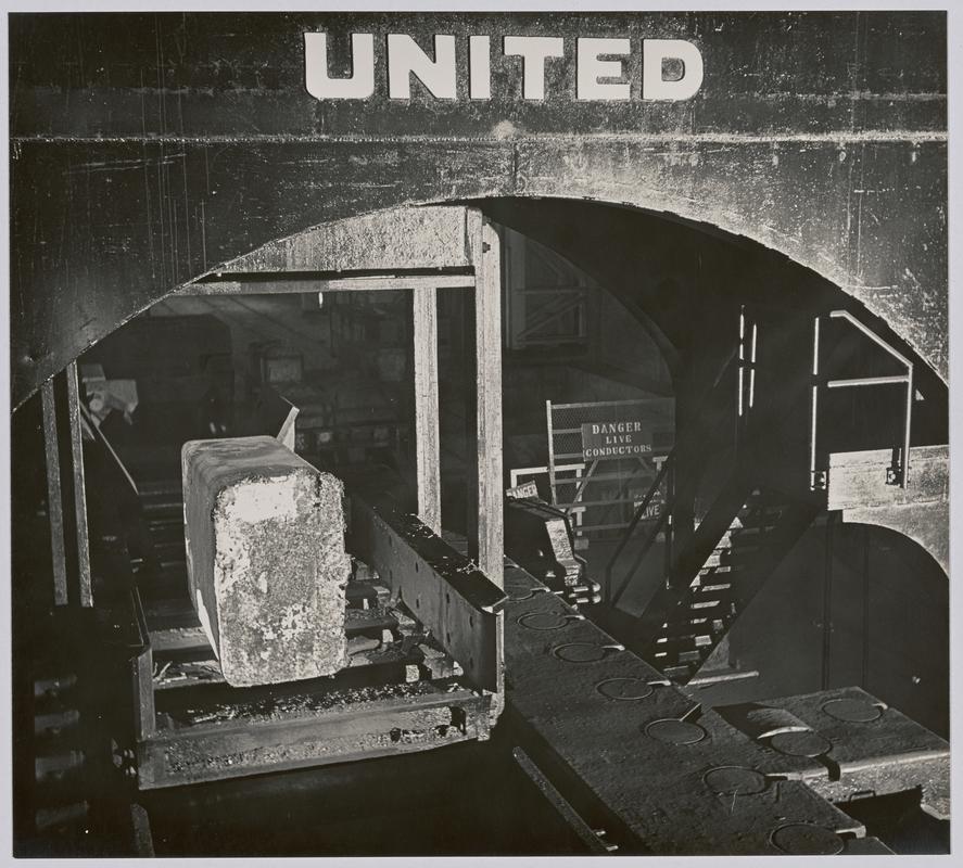 Transfering steel ingot - Photographs of steelworks and South Wales