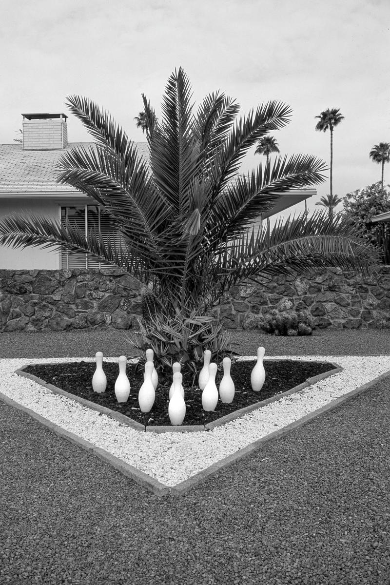 USA. ARIZONA. Sun City. Front garden for ex champion bowler. 1992