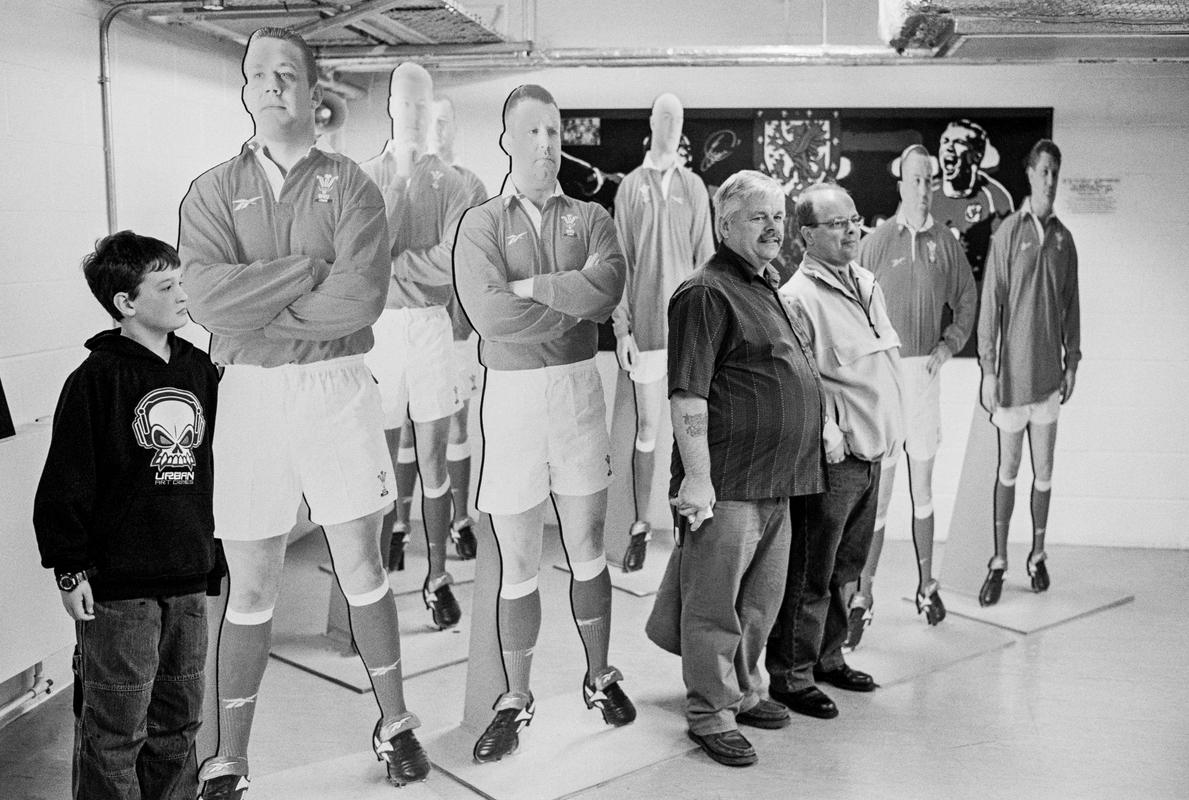 GB. WALES. Cardiff. Millennium Stadium tour. The rugby dressing rooms with pop ups of the Welsh team. 2004.