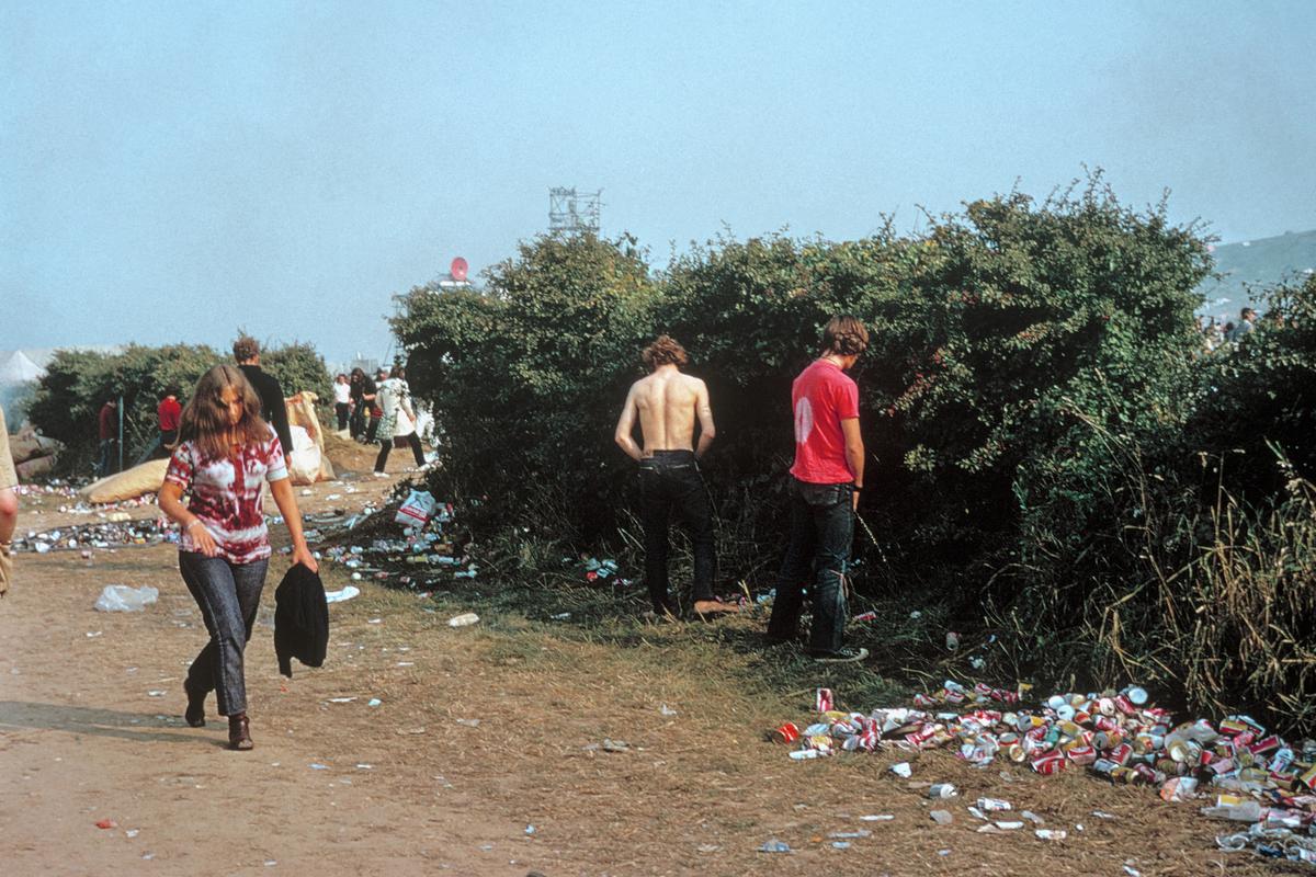 GB. ENGLAND. Isle of Wight Festival. Going to the toilet. Some get impatient and do the best they can. 1969.