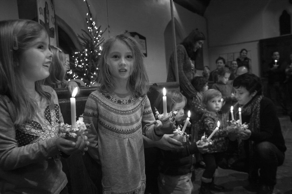 GB. WALES. Tintern. Christingle Service in St Michael&#039;s church. 2012.