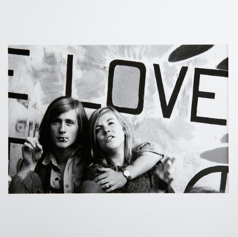 Two young protestors rest outside the convention hall during the turbulent 1968 Democratic National Convention