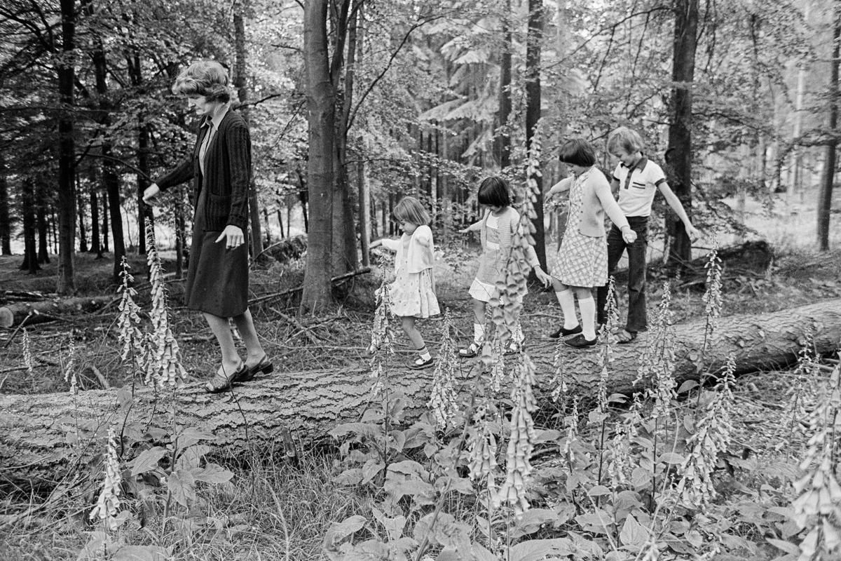 GB. WALES. Llaneglwys. The smallest school in the UK. Four students. Field nature lesson. 1977.