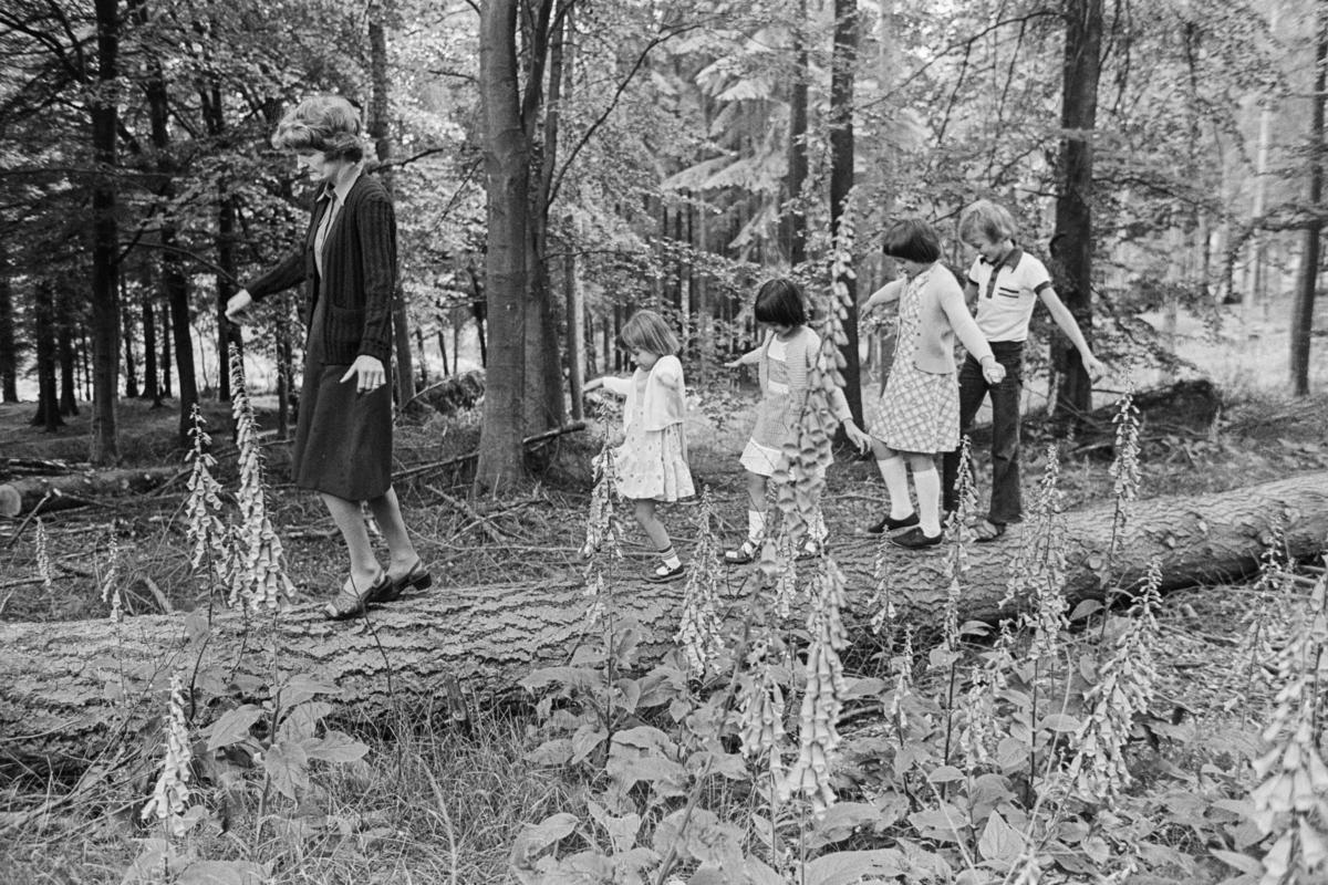 GB. WALES. Llaneglwys. The smallest school in the UK. Four students. Field nature lesson. 1977.