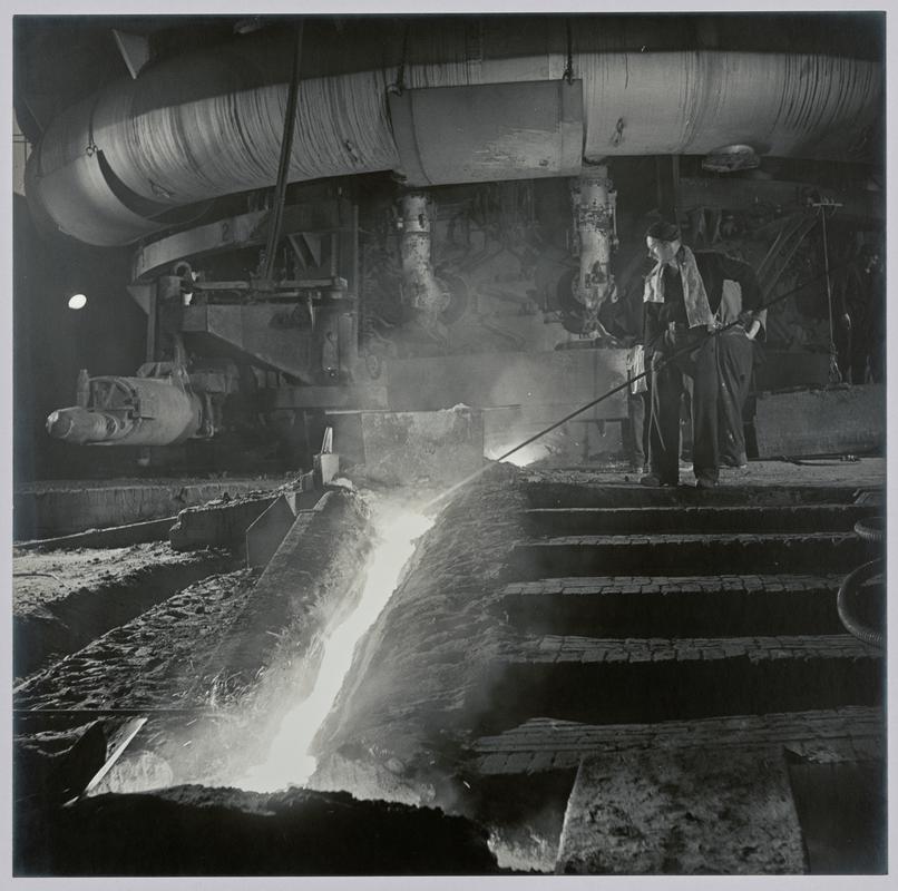 &quot;Blast Furnace, Margam&quot; tapping the blast furnace (shows bustle pipe, injecting super heated air) - Photograph of steelworks and South Wales