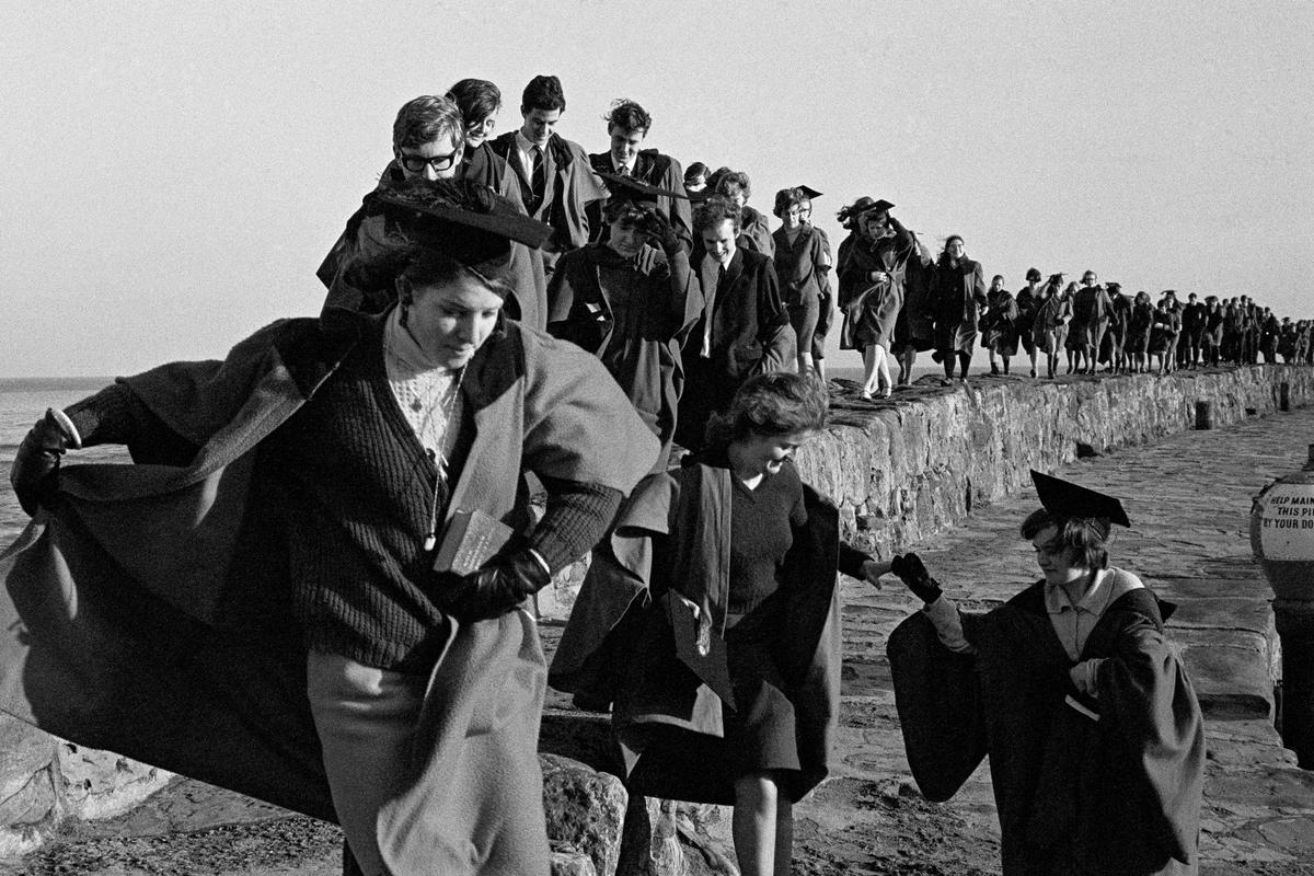 GB. SCOTLAND. St Andrews, The Pier Walk is an ancient University tradition in which all students can take part. On Sundays (and some special occasions), students meet in St Salvators Quad before walking down to the harbour wearing their gowns  the reason for this custom is lost in the mists of time! Gowns encouraged but not compulsory. 1967