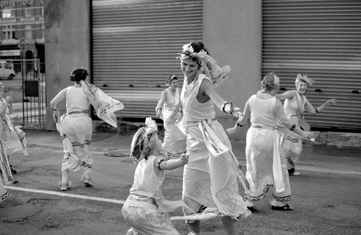 GB. WALES. Cardiff. Butetown - once know as &#039;Tiger Bay&#039;. Dancers in costume at the annual Butetown carnival. 2000