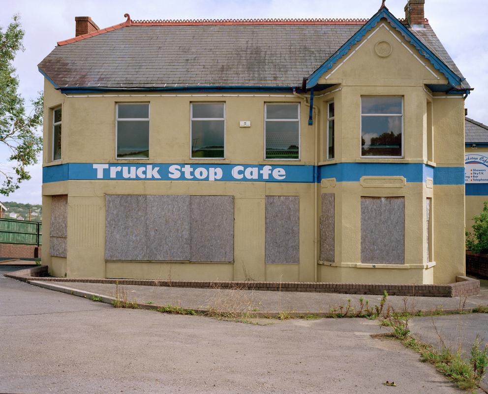 GB. WALES. Abandoned building aside the A40. 2004.