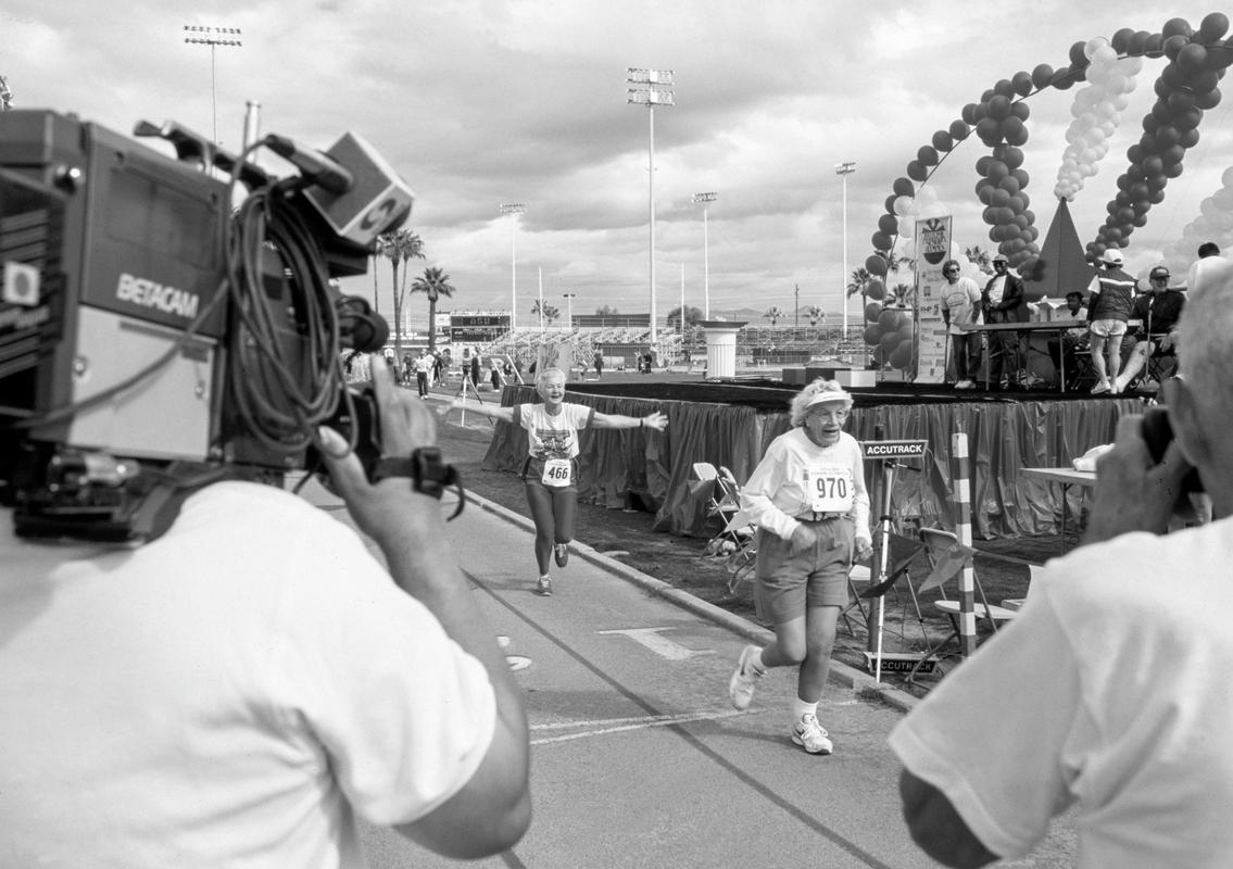 USA. ARIZONA. Phoenix. Senior Olympics. Winner of one of the womens races during the track day. 1994.