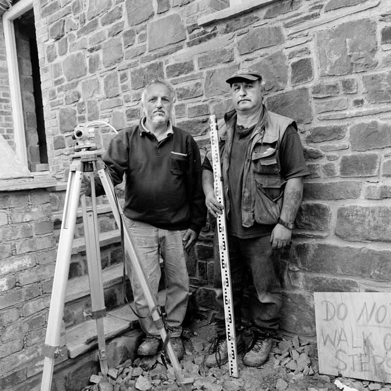 Domenico &amp; Rafael Colella. Photo shot: Mathry, 30th September 2002. DOMENICO COLELLA - Place and date of birth: Calabria, Italy 1950. Main occupation: Master Builder. First language: English. Other languages: Italian. Lived in Wales: Since 1955. RAFAEL COLELLA - Place and date of birth: Calabria, Italy 1953. Main occupation: Master builder. First language: English. other languages: Italian. Lived in Wales: Since 1955.