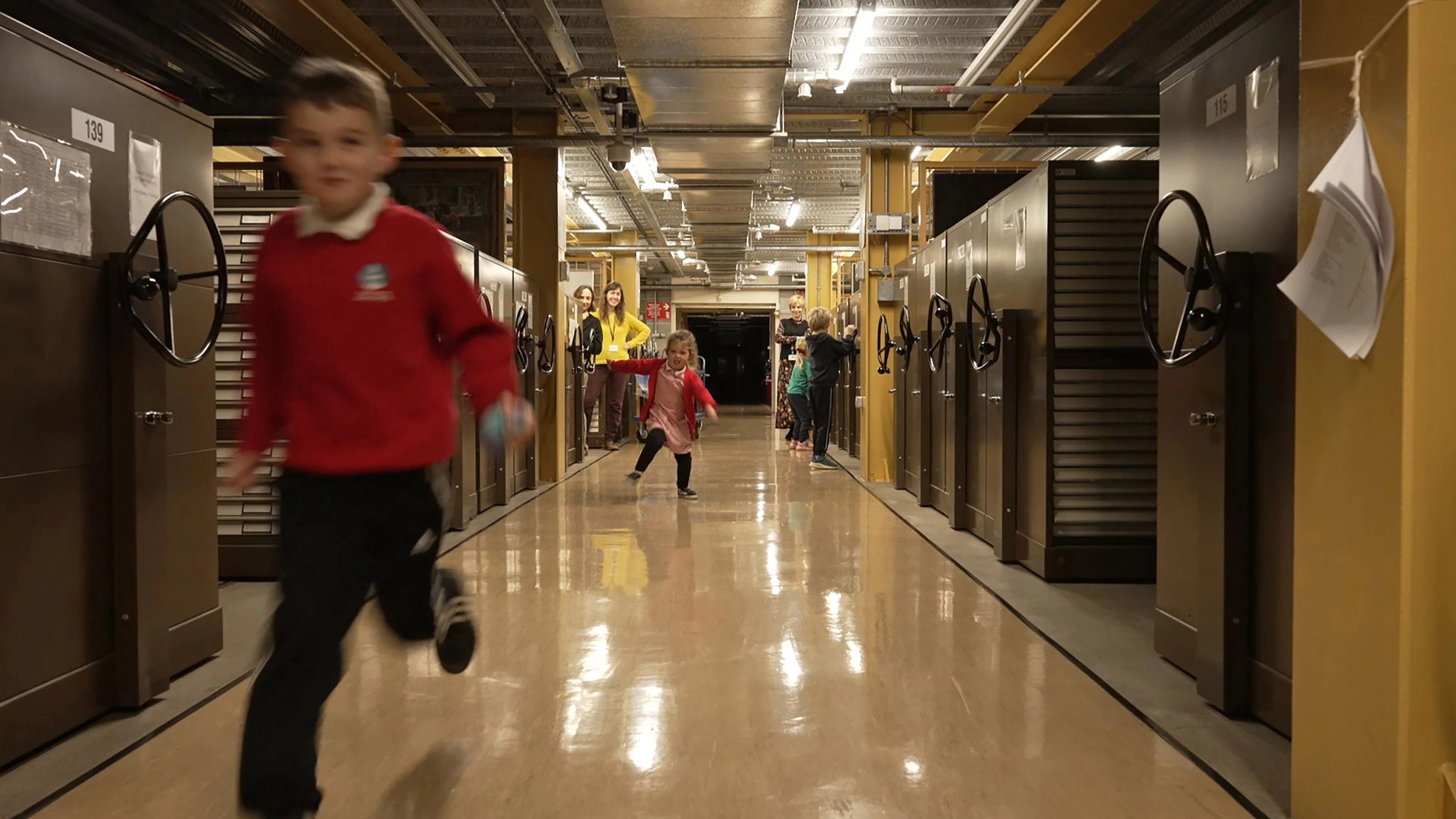 Children running in an art store.