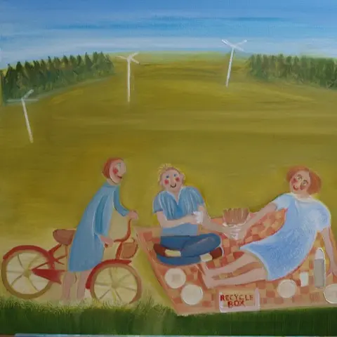A colourful painting of three people sharing a picnic in a field. In the background are three windmills and trees. Two people sit on a blanket, and one stands with their bike.